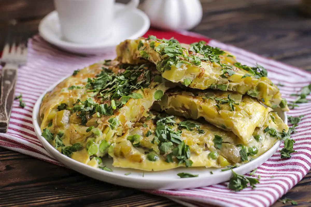 Tortilla de cartofi și spanac: o rețetă rapidă pentru prânz cu un secret care face diferența